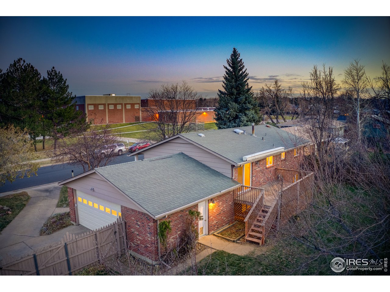 385 Manhattan Drive Boulder, CO 80303 - Photo 28 of 28 a view of a tennis ground in the middle of a yard