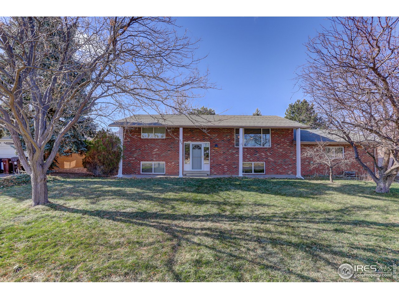 385 Manhattan Drive Boulder, CO 80303 - Photo 3 of 28 a view of a house with a yard