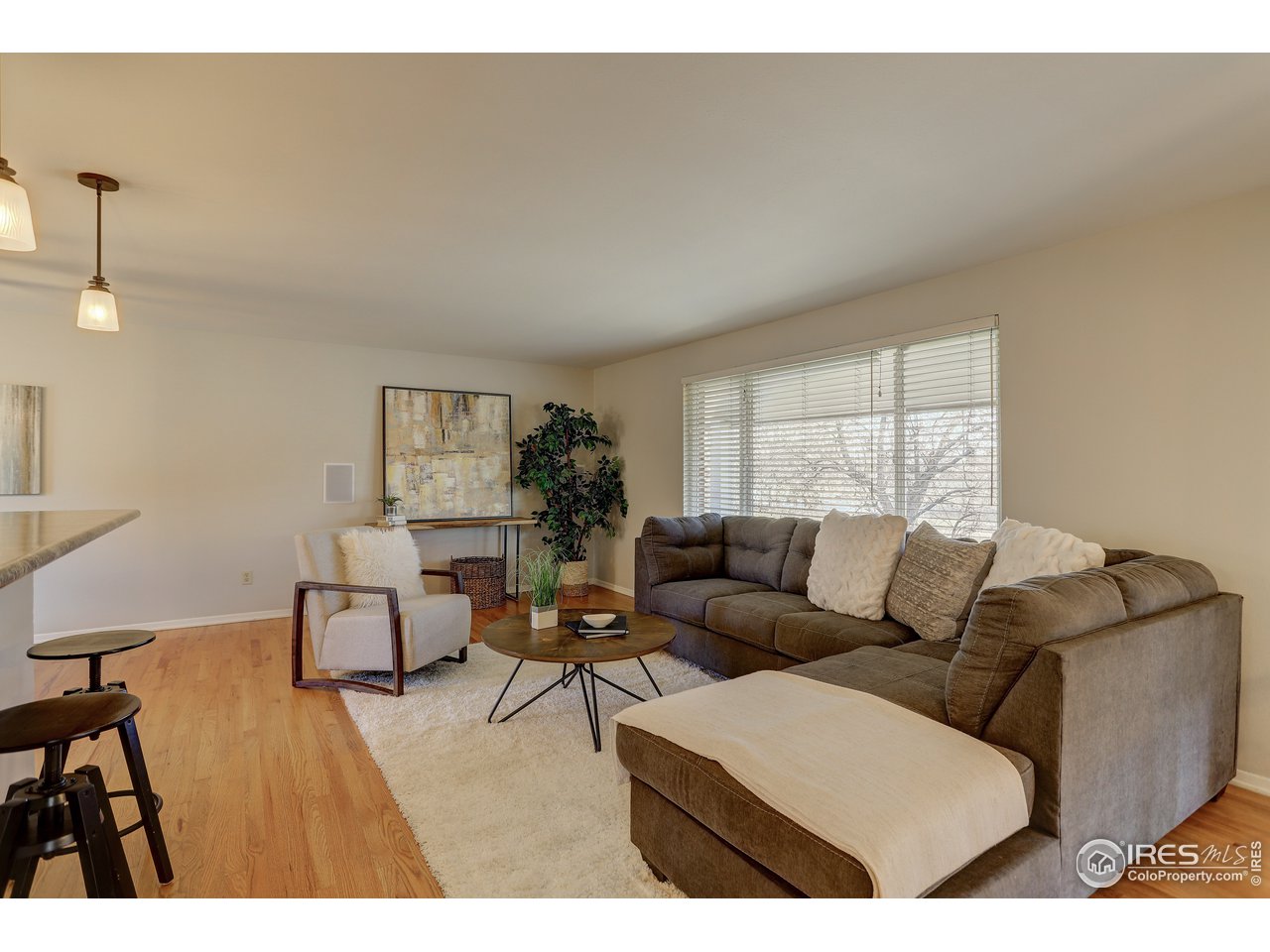 385 Manhattan Drive Boulder, CO 80303 - Photo 4 of 28 a living room with furniture and a window