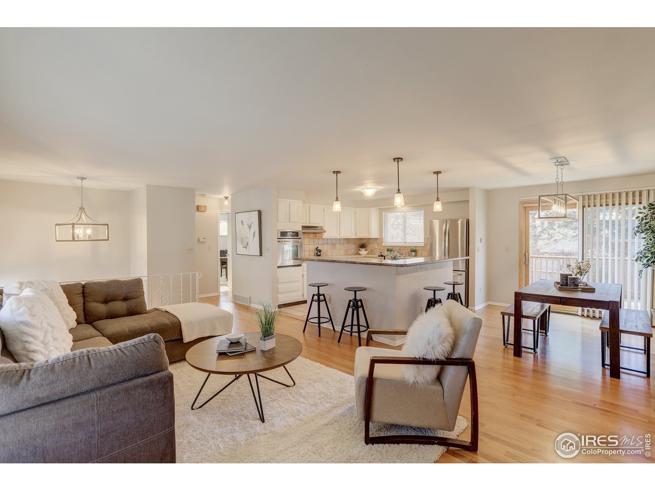385 Manhattan Drive Boulder, CO 80303 - Photo 6 of 28 a living room with furniture and kitchen view
