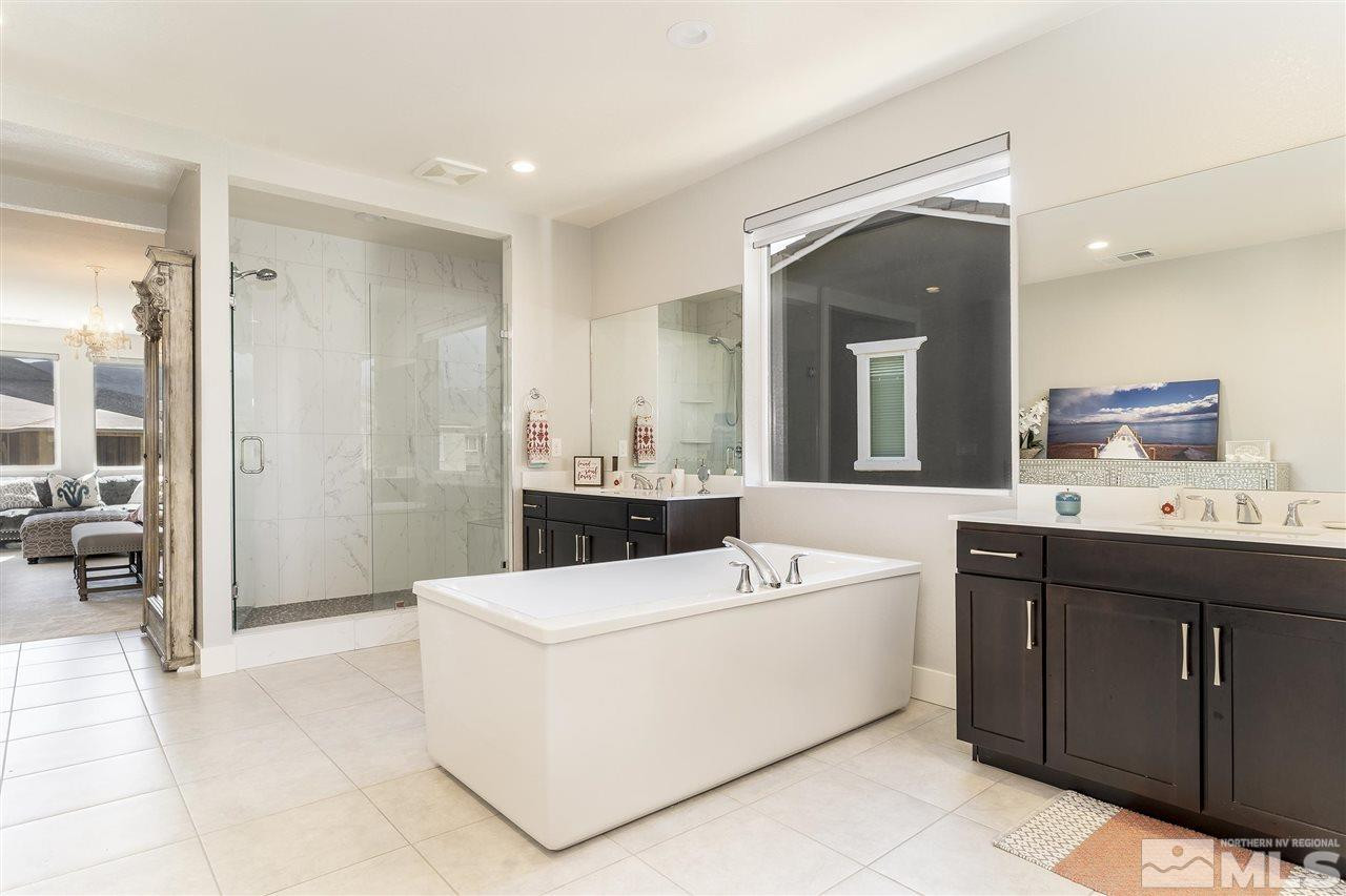 9272 Red Spring Drive Reno, NV 89521 - Photo 12 of 25 a living room with a sink vanity and a mirror