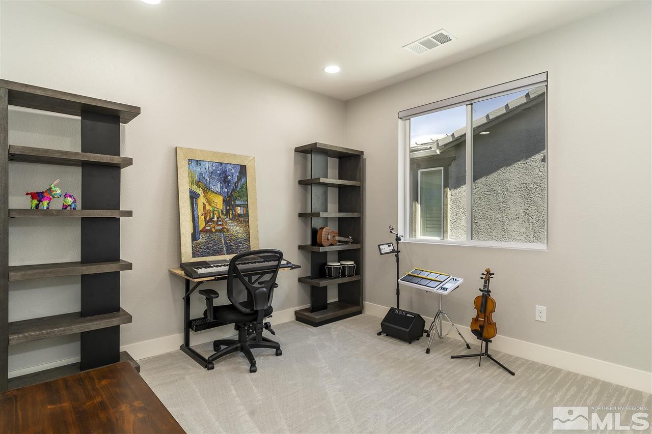 9272 Red Spring Drive Reno, NV 89521 - Photo 15 of 25 a view of a workspace with furniture and a window