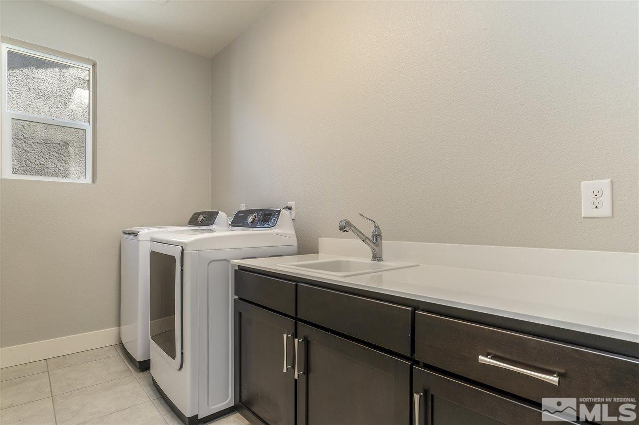 9272 Red Spring Drive Reno, NV 89521 - Photo 17 of 25 a utility room with dryer and washer