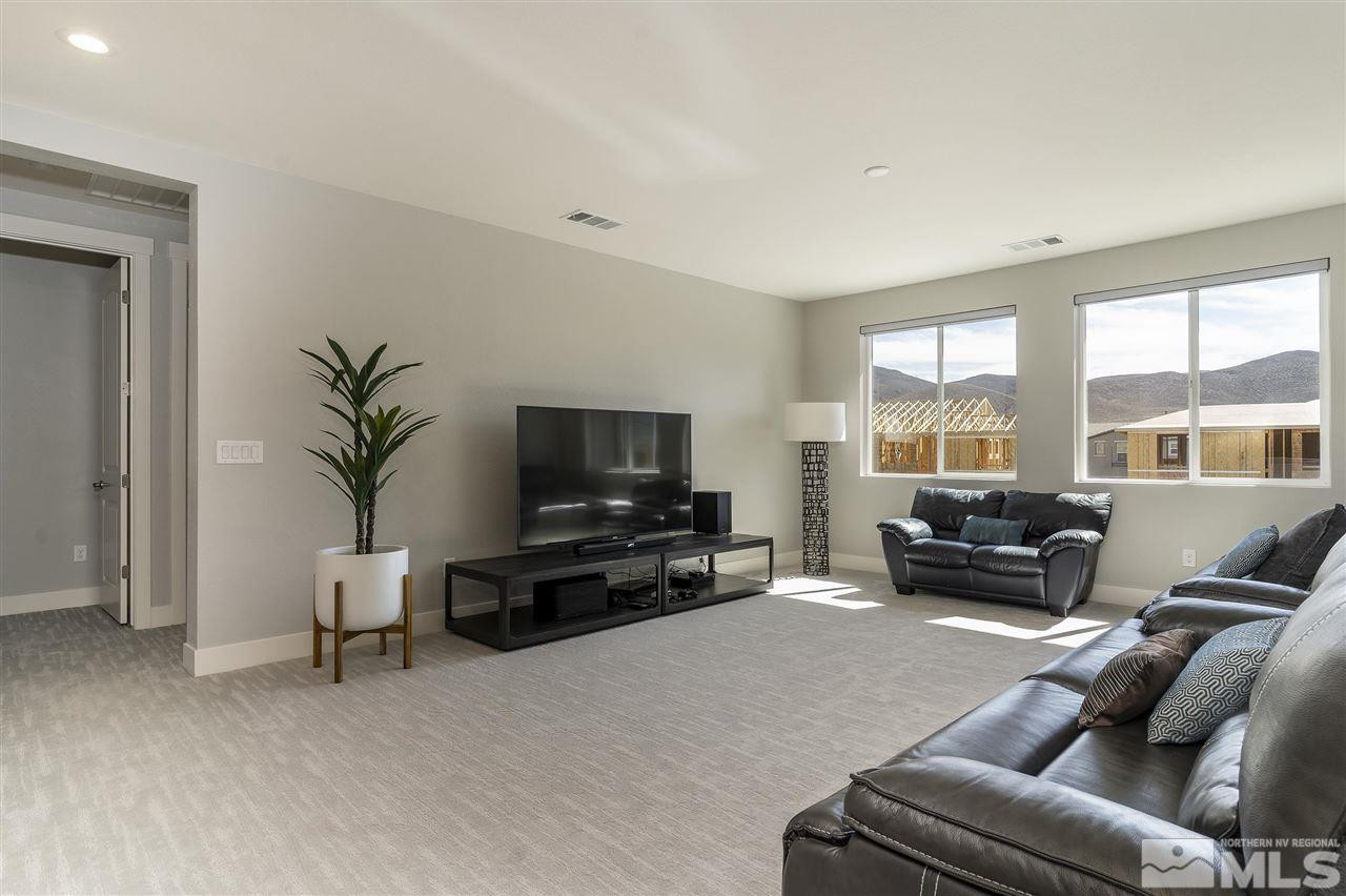 9272 Red Spring Drive Reno, NV 89521 - Photo 18 of 25 a living room with furniture and a flat screen tv