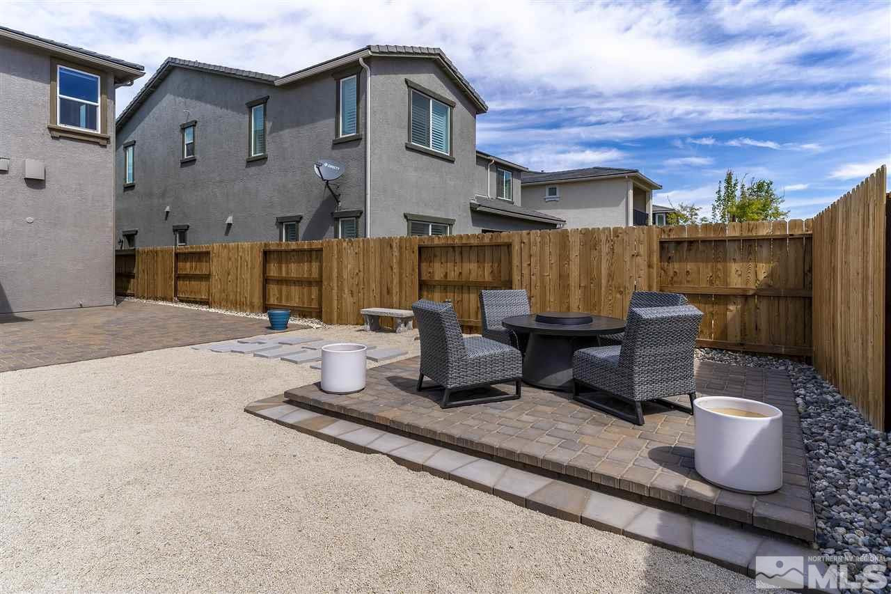 9272 Red Spring Drive Reno, NV 89521 - Photo 24 of 25 a bench is sitting in front of a brick building