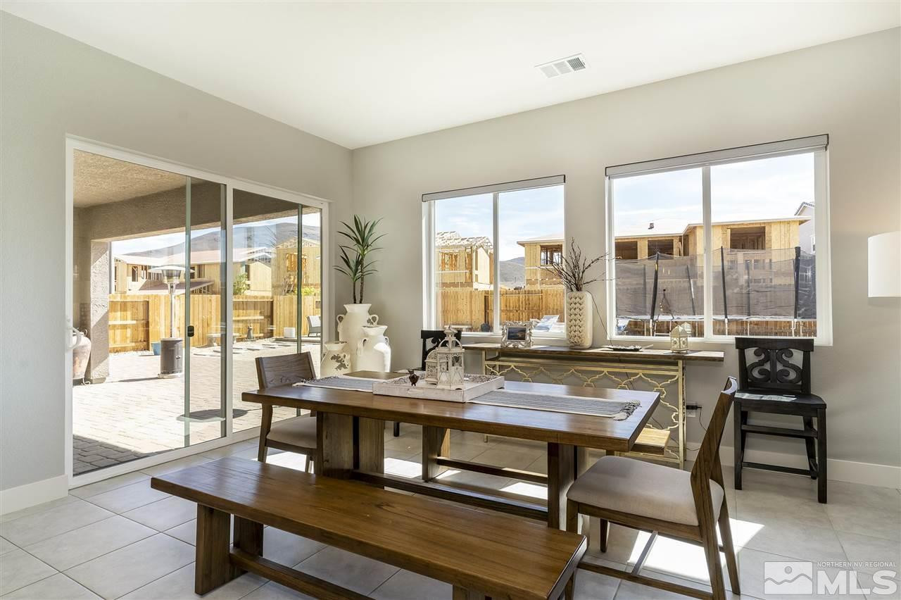 9272 Red Spring Drive Reno, NV 89521 - Photo 8 of 25 a view of a dining room with furniture window and outside view