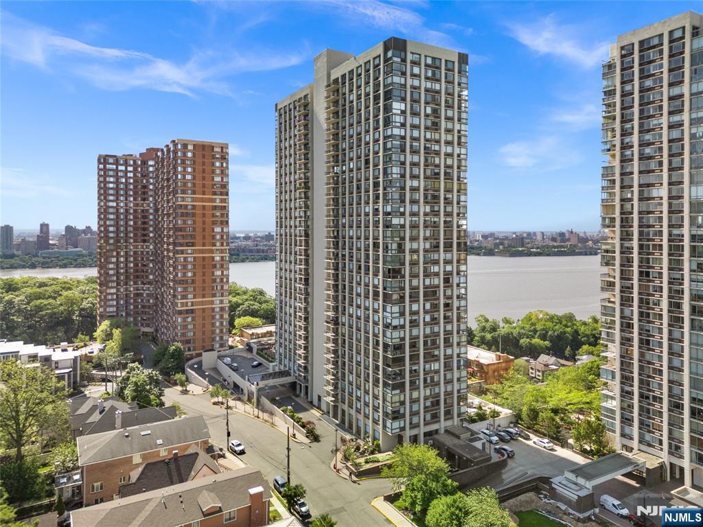 200 Old Palisade Road, Unit 21J Fort Lee, NJ 07024 - Photo 2 of 29 a view of a city with tall buildings