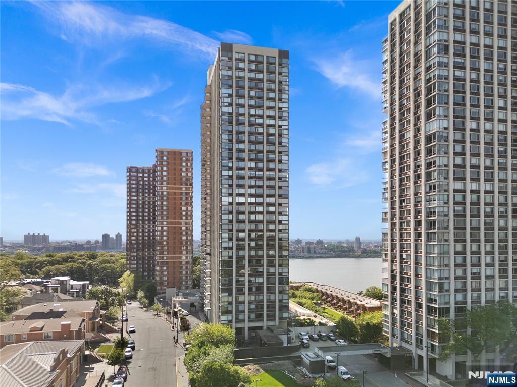 200 Old Palisade Road, Unit 21J Fort Lee, NJ 07024 - Photo 26 of 29 a view of a city with tall buildings