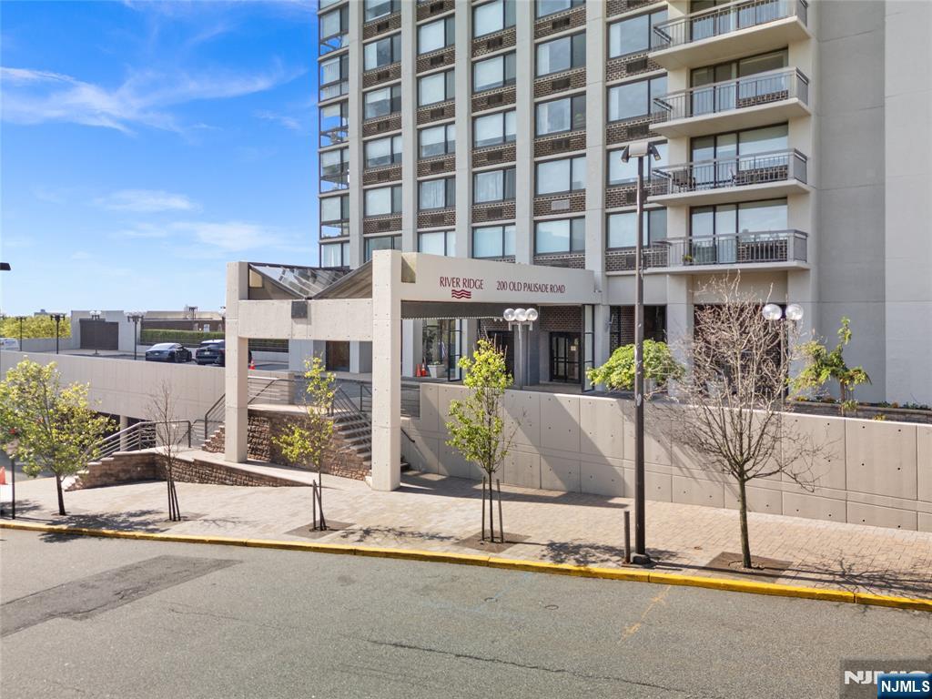200 Old Palisade Road, Unit 21J Fort Lee, NJ 07024 - Photo 28 of 29 a view of building with street view