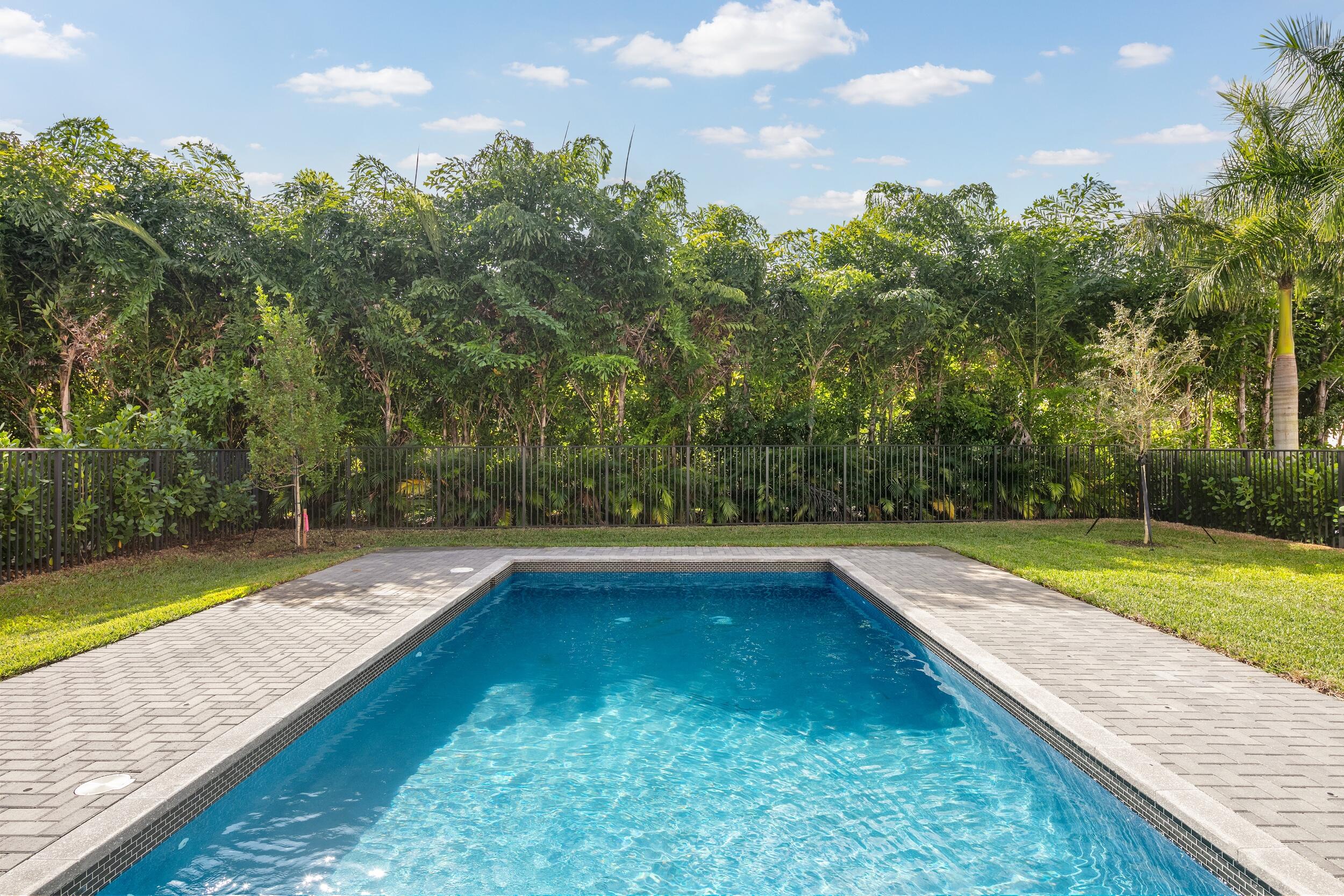 9132 Benedetta Place Boca Raton, FL 33496 - Photo 22 of 50 a view of swimming pool with a yard