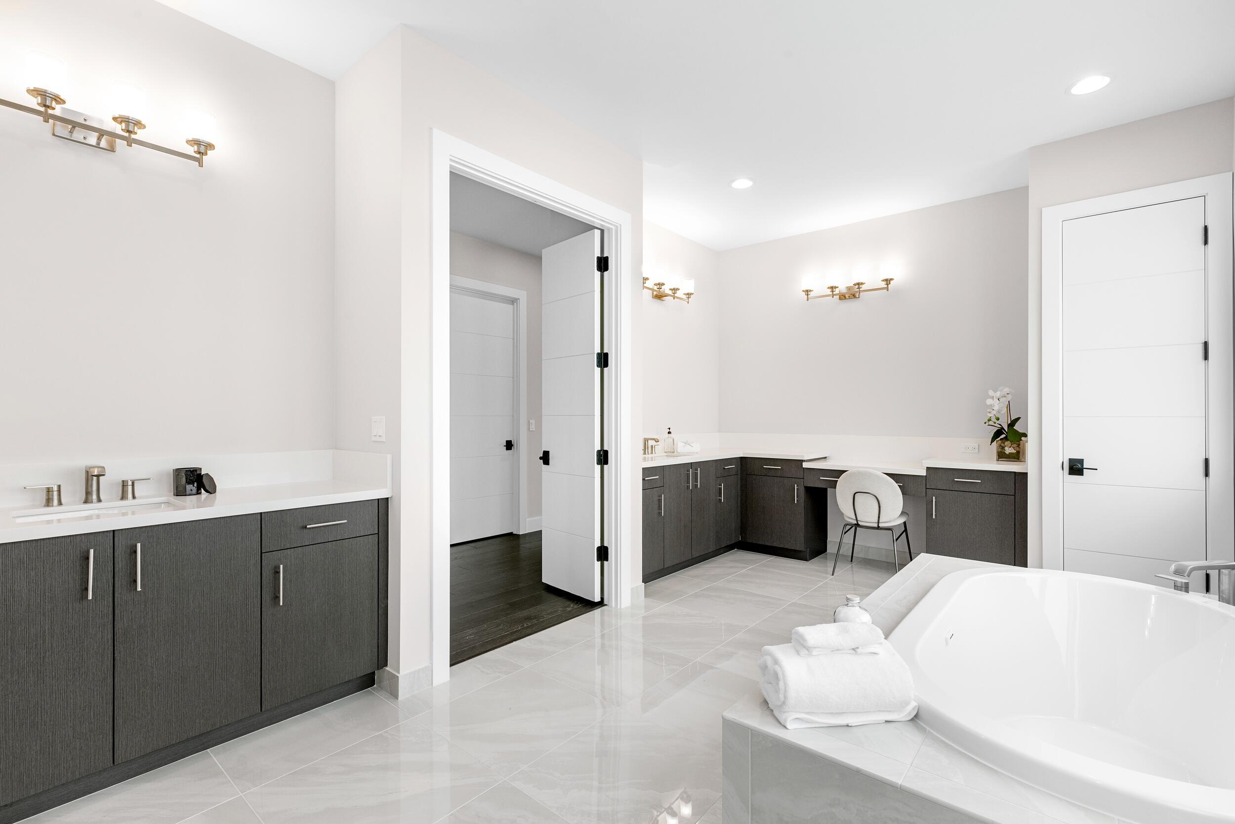 9132 Benedetta Place Boca Raton, FL 33496 - Photo 34 of 50 a bedroom with a bed and a dresser