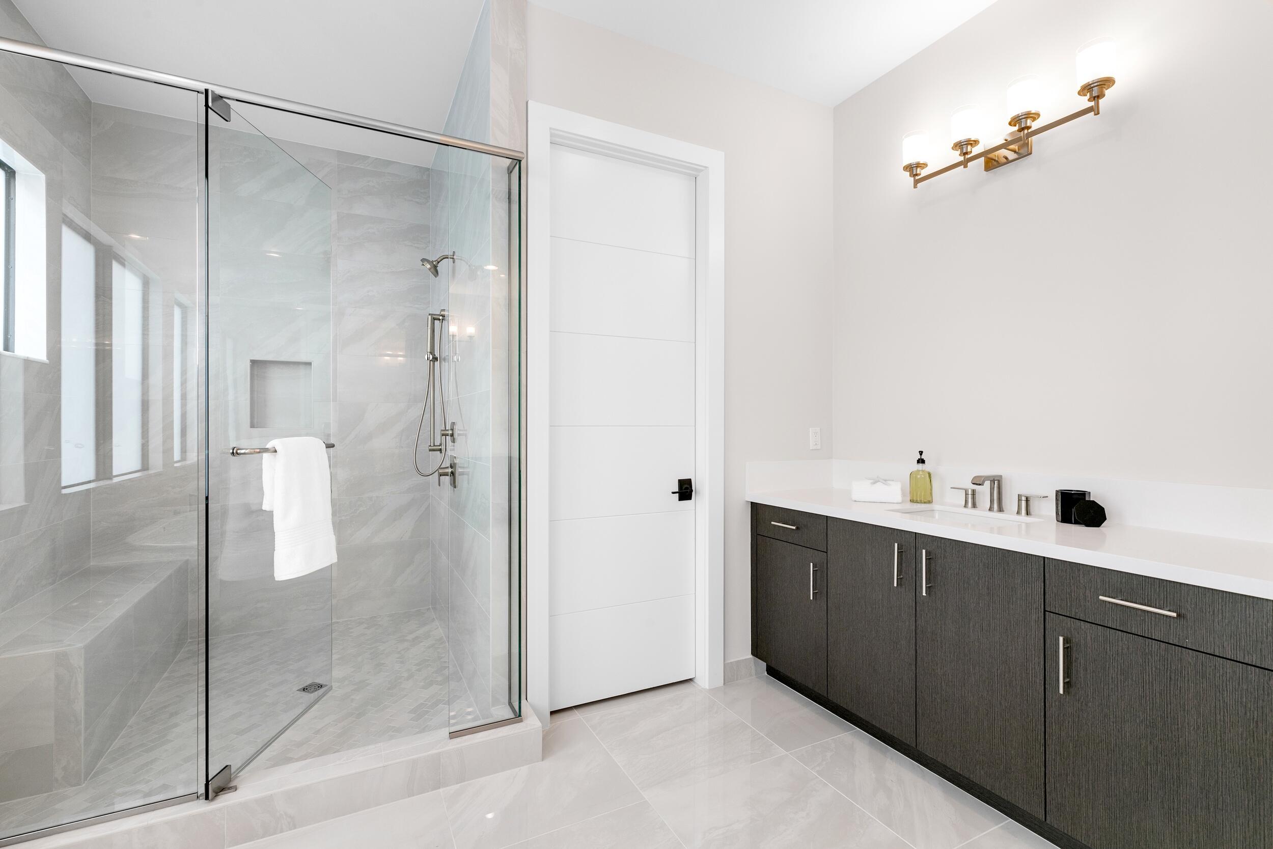 9132 Benedetta Place Boca Raton, FL 33496 - Photo 37 of 50 a view of a bathroom with a shower and sink