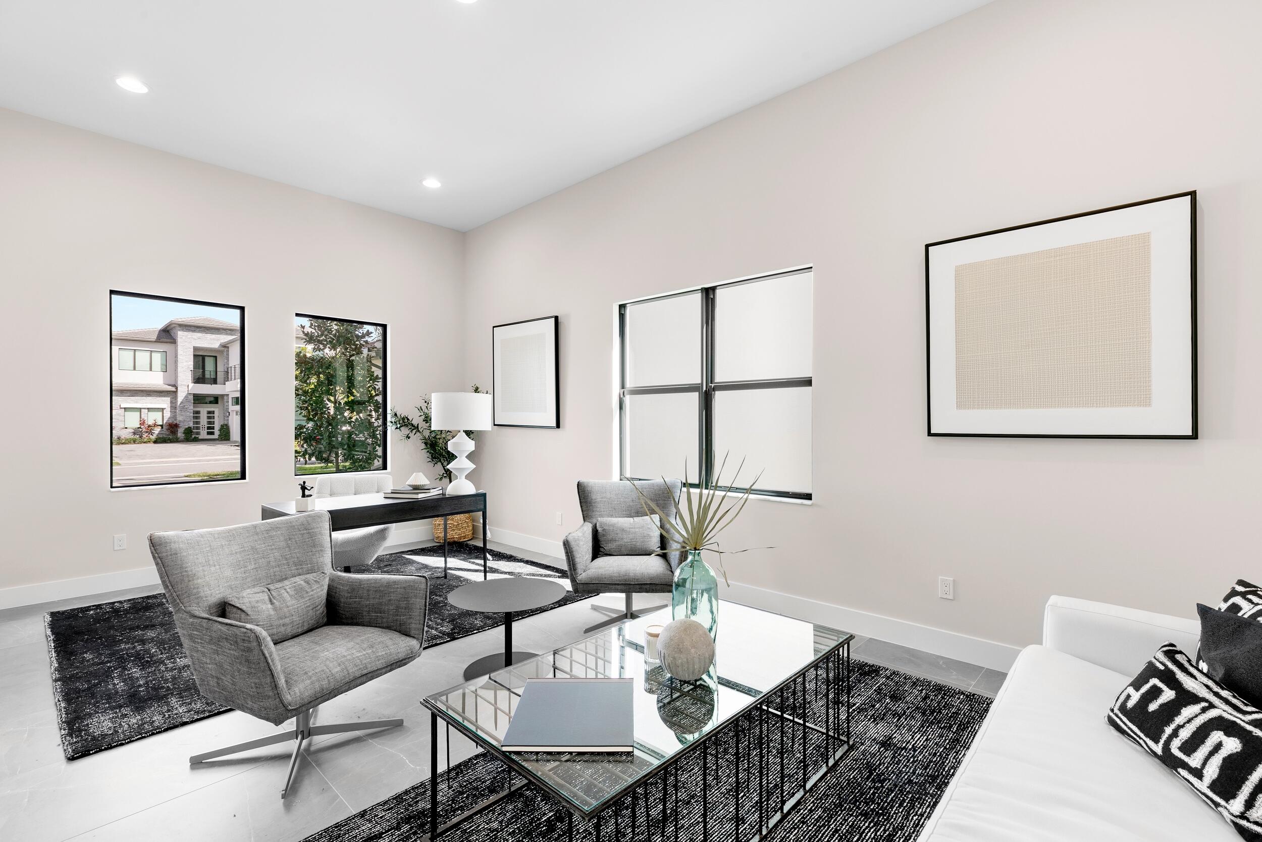 9132 Benedetta Place Boca Raton, FL 33496 - Photo 5 of 50 a living room with furniture and a window