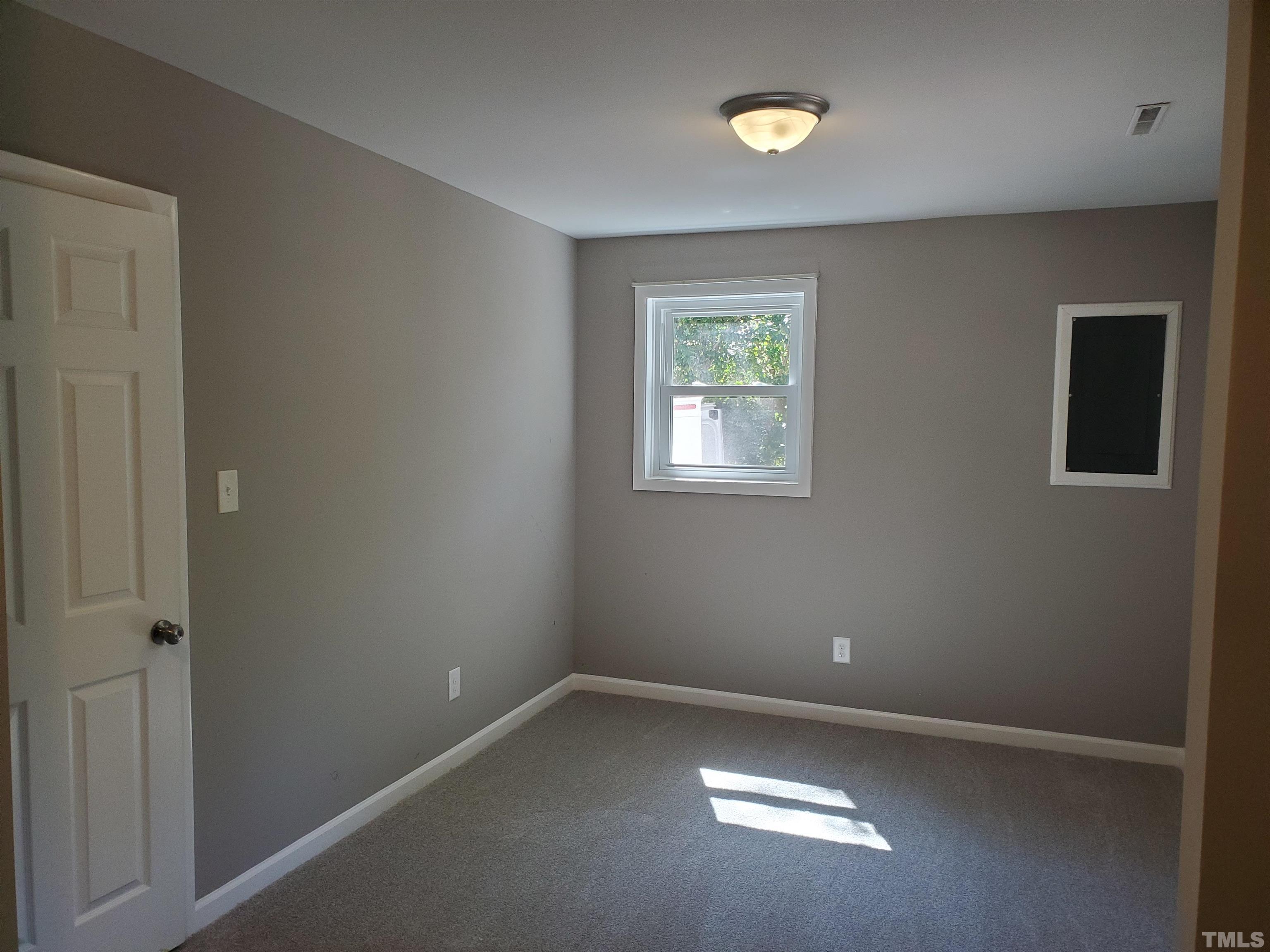 2006 Myron Drive Raleigh, NC 27607 - Photo 23 of 28 an empty room with a window
