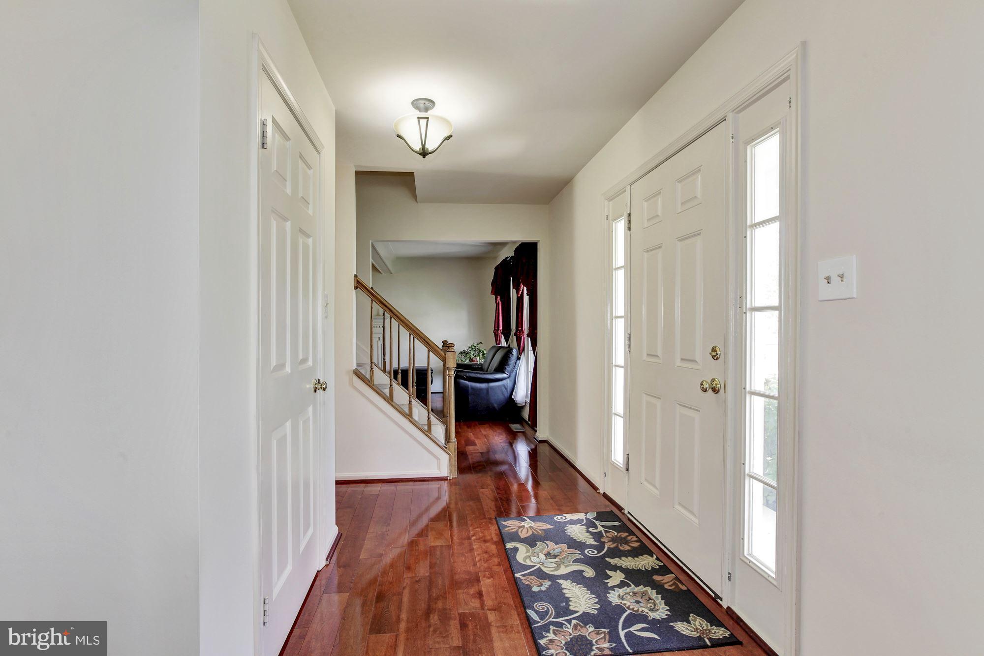 1611 Spottsworth Way Silver Spring, MD 20905 - Photo 2 of 30 Welcoming foyer with hardwoods, sidelights