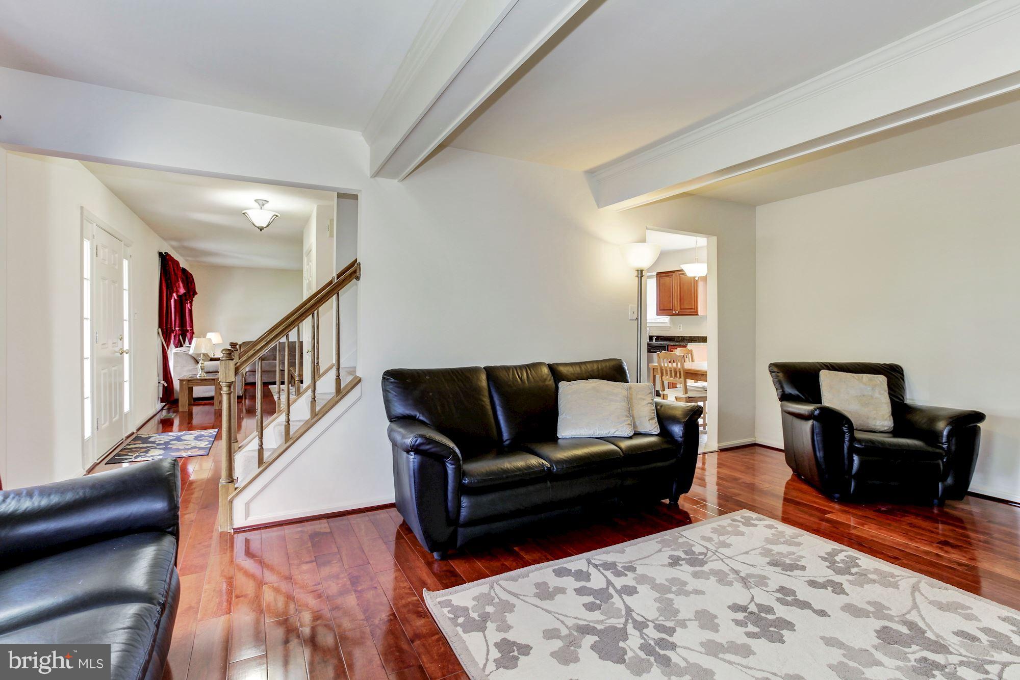 1611 Spottsworth Way Silver Spring, MD 20905 - Photo 12 of 30 Newer hardwoods through main living areas