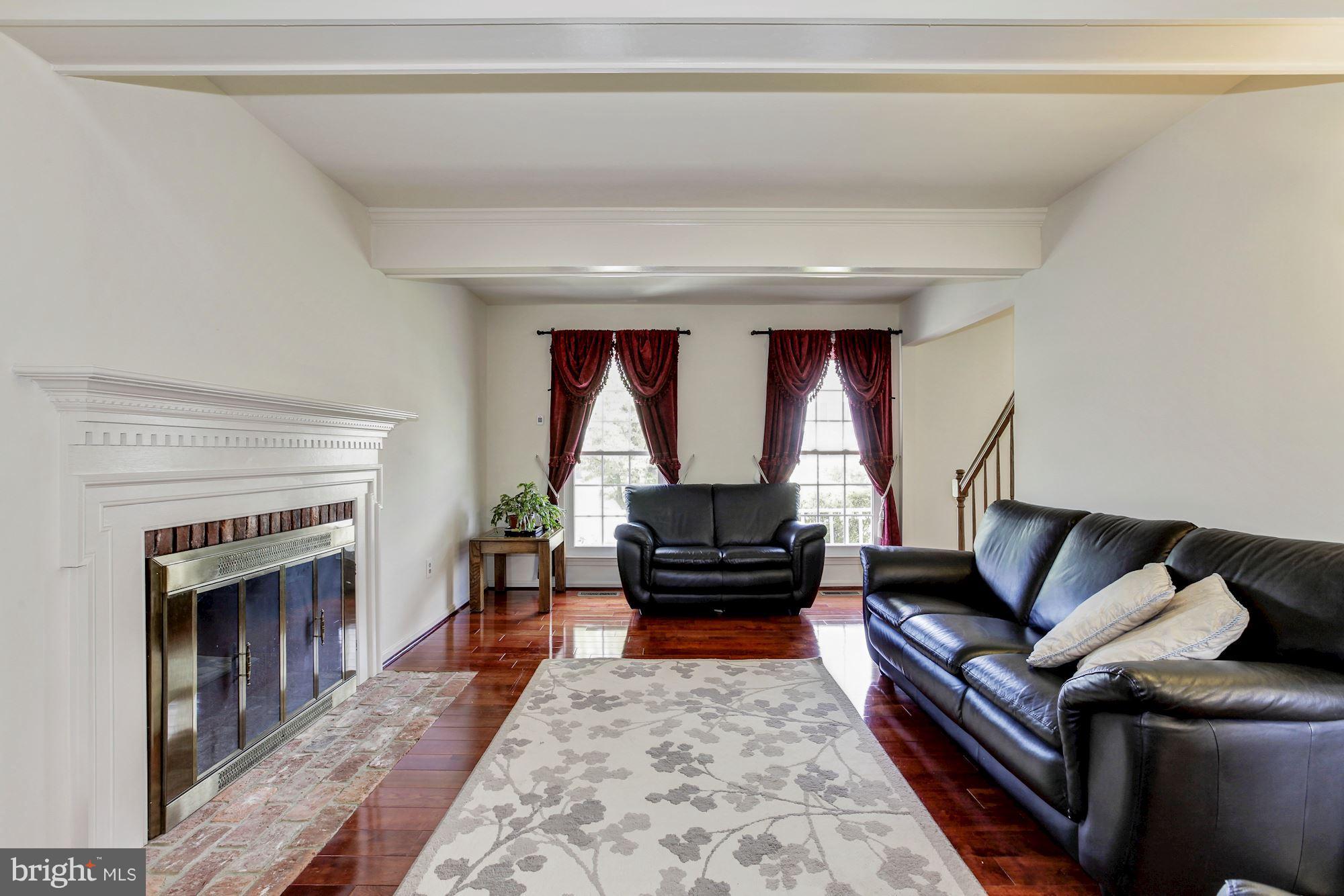 1611 Spottsworth Way Silver Spring, MD 20905 - Photo 13 of 30 Brick hearth, natural light, great flow