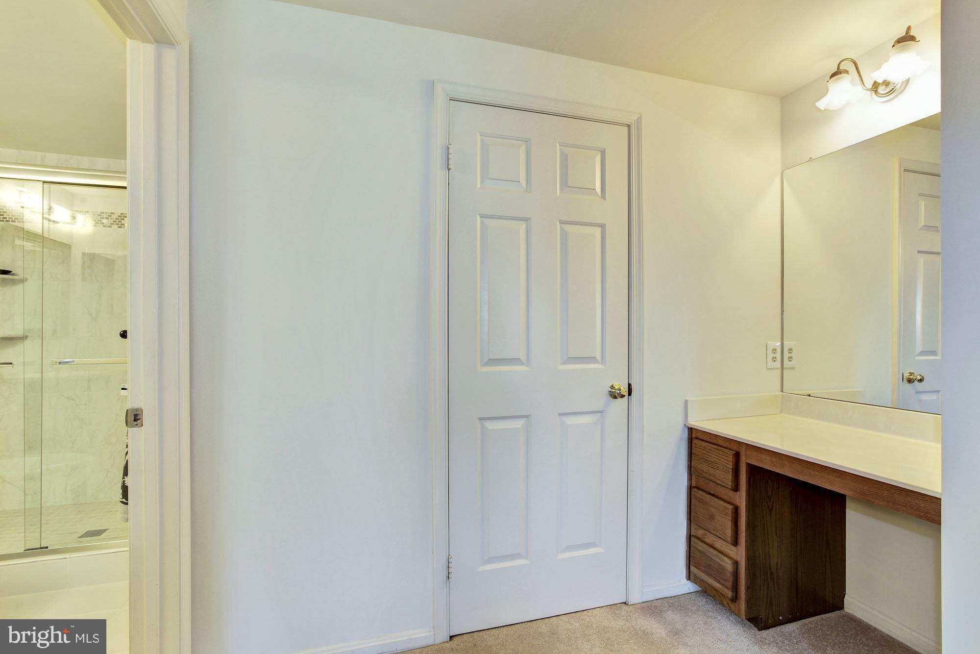 1611 Spottsworth Way Silver Spring, MD 20905 - Photo 16 of 30 Bedroom dressing area, closet, vanity