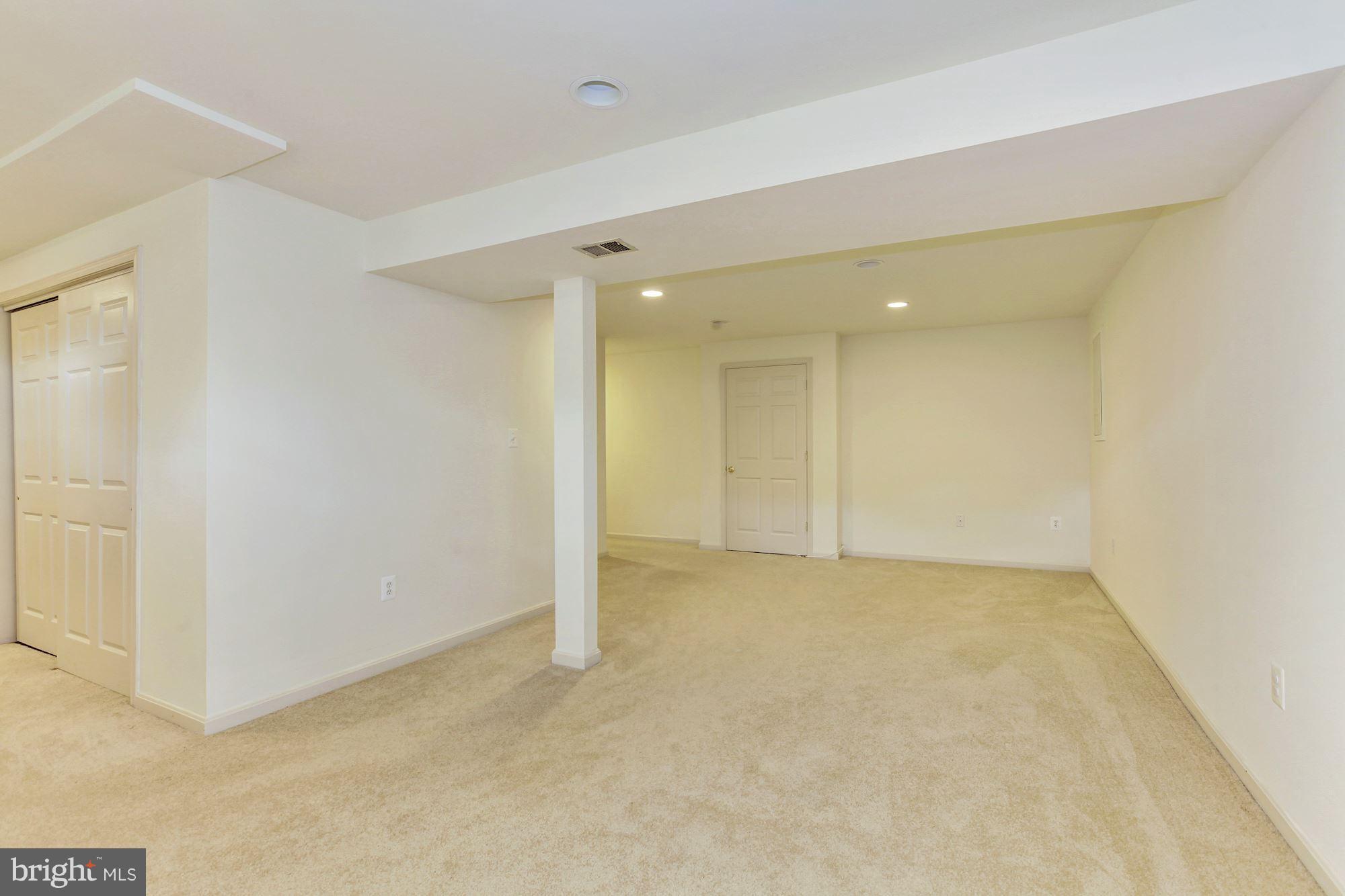 1611 Spottsworth Way Silver Spring, MD 20905 - Photo 25 of 30 LL rec room with recessed lighting
