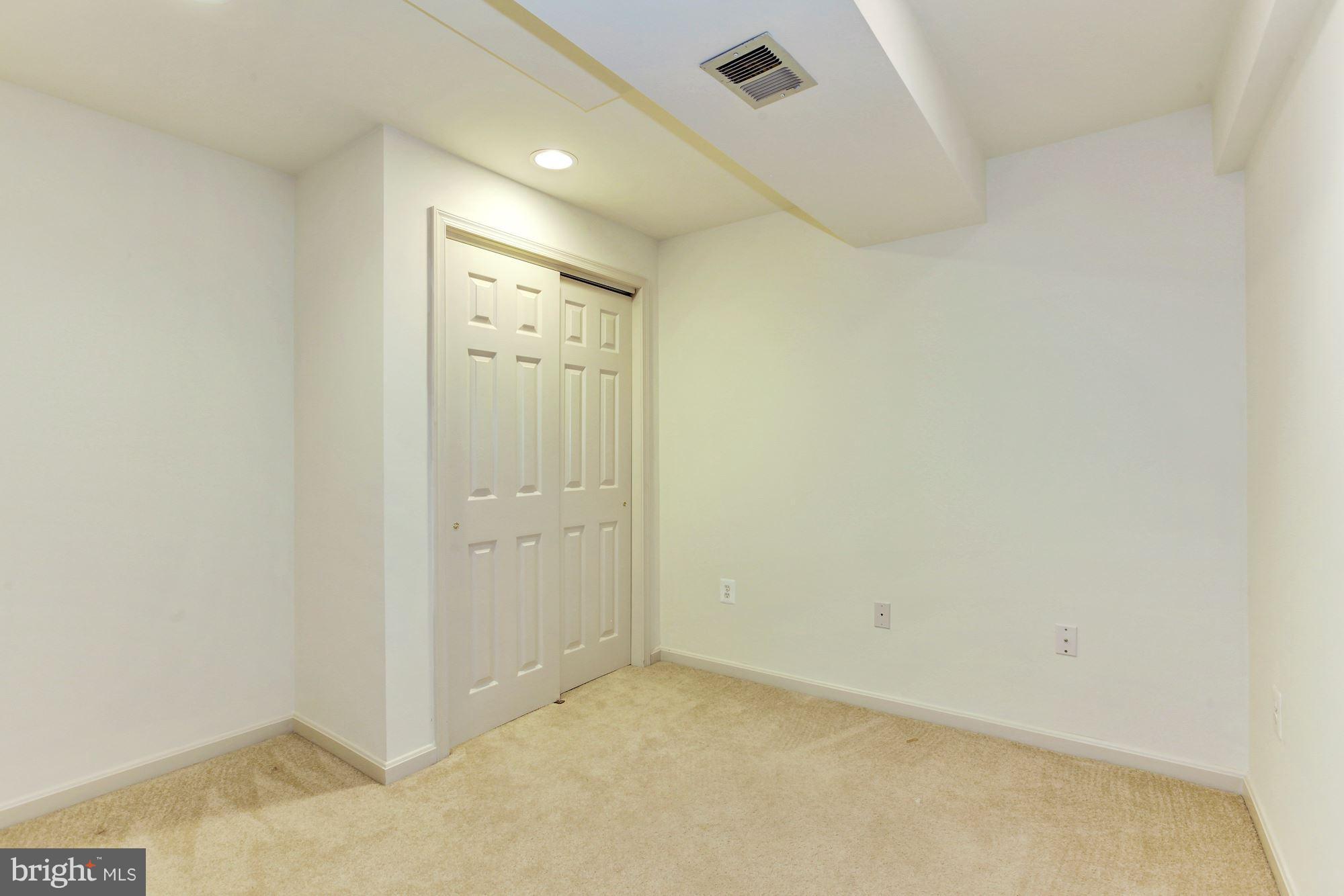1611 Spottsworth Way Silver Spring, MD 20905 - Photo 27 of 30 Additional room in LL with closet