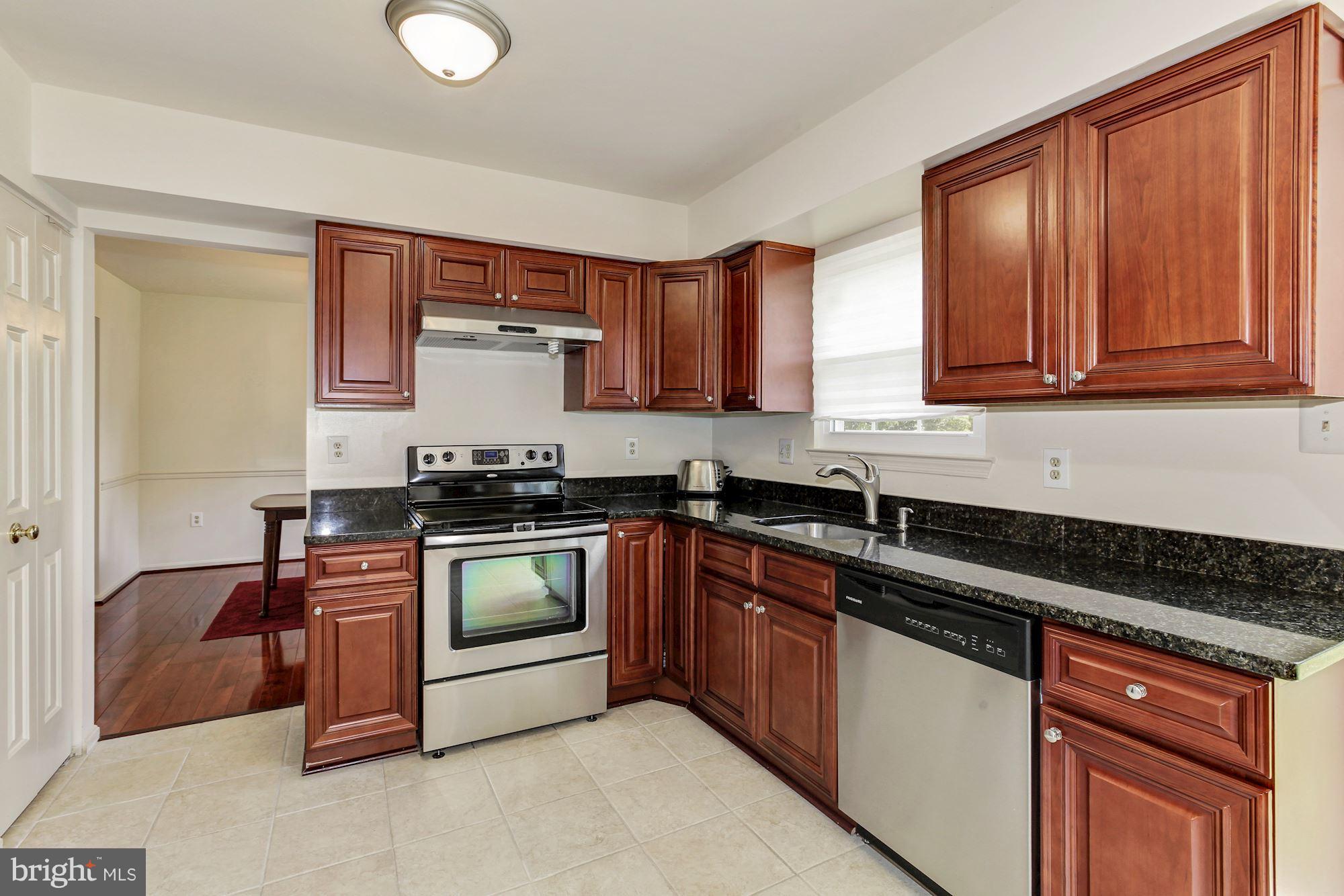 1611 Spottsworth Way Silver Spring, MD 20905 - Photo 4 of 30 Kitchen with pantry, space for cooking