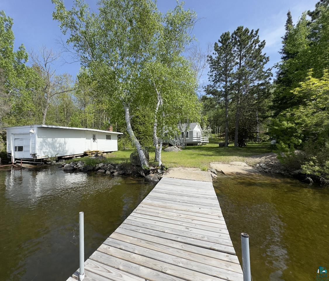 3739 Sundling Road Tower, MN 55790 - Photo 8 of 15 Dock area with a water view and a yard
