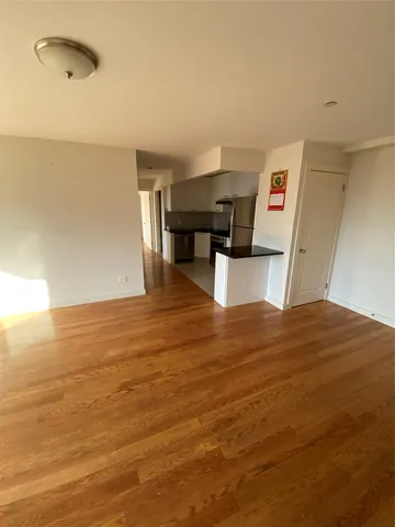 a bedroom with bed and window