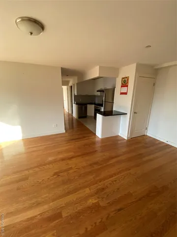 a bedroom with bed and window