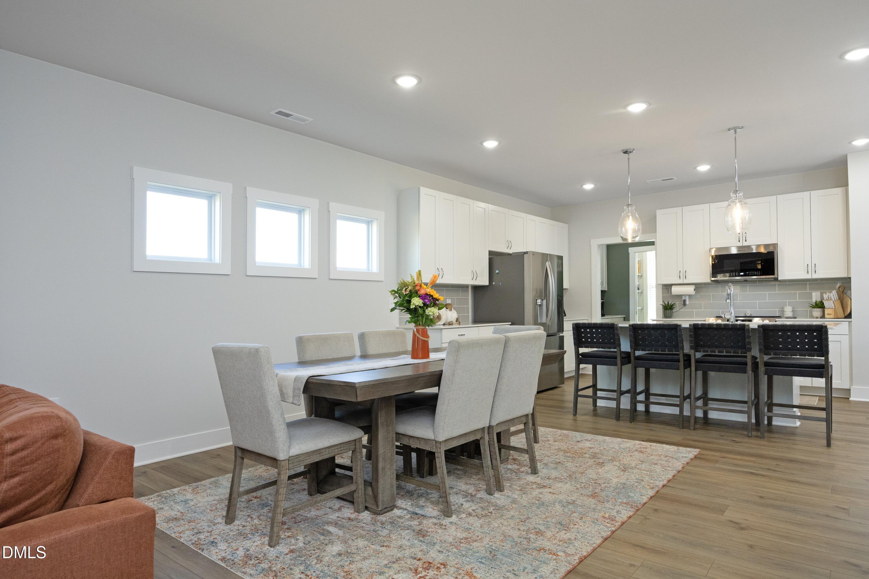 91 Kitty Br Way Clayton, NC 27520 - Photo 15 of 51 a view of a dining room with furniture