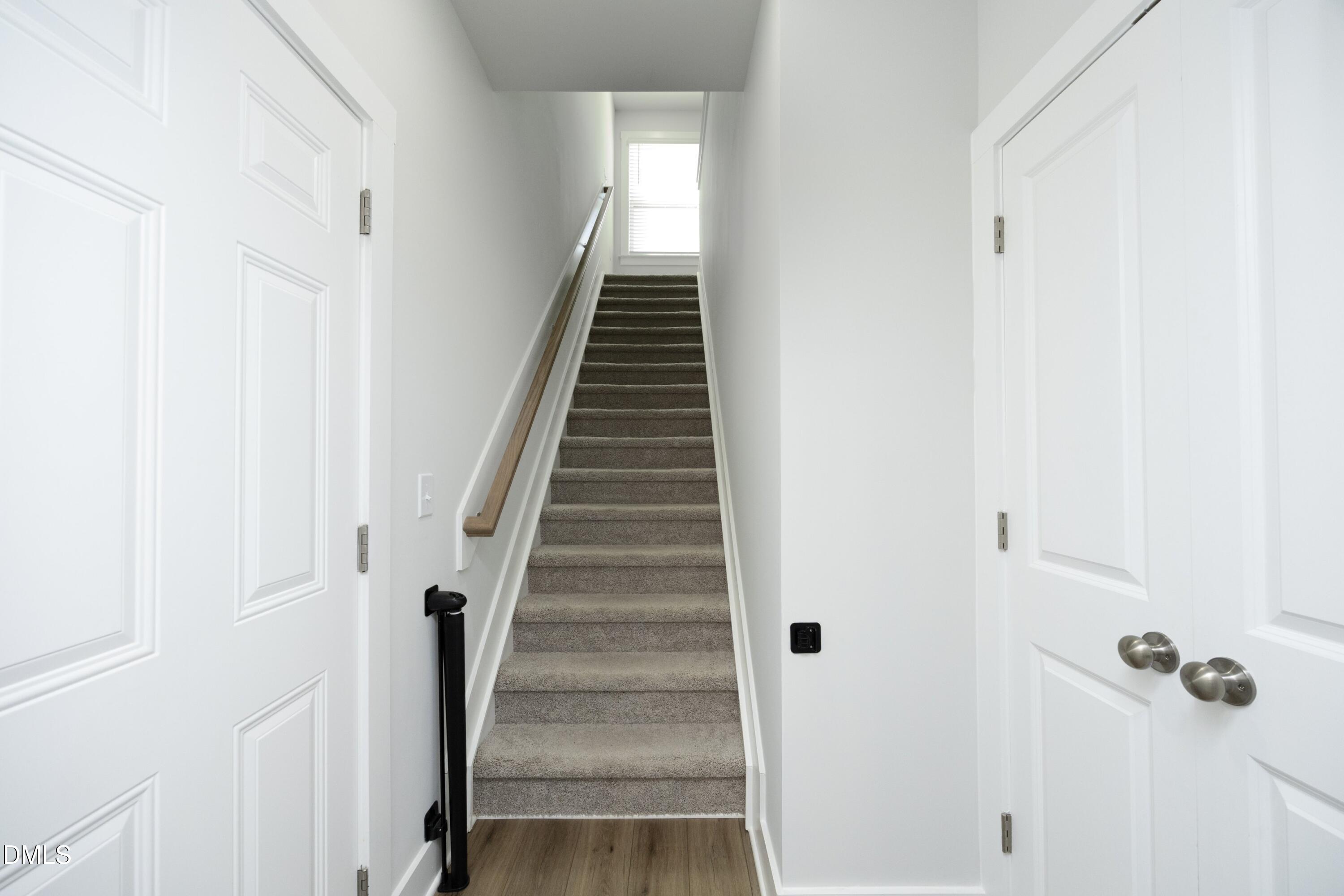 91 Kitty Br Way Clayton, NC 27520 - Photo 30 of 51 a view of a hallway with staircase
