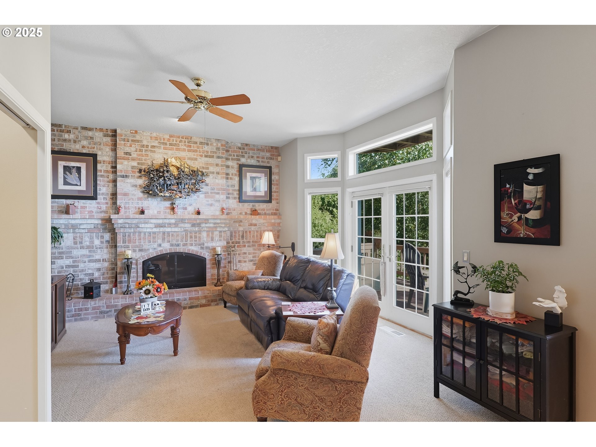 14362 Southwest 134th Drive Portland, OR 97224 - Photo 11 of 36 a living room with furniture and a fireplace