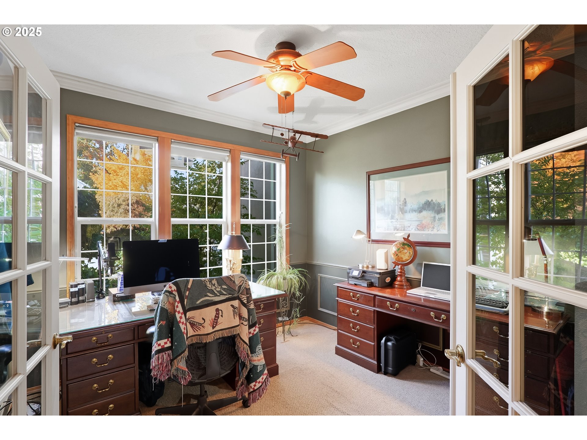 14362 Southwest 134th Drive Portland, OR 97224 - Photo 7 of 36 a living room with furniture a flat screen tv and a floor to ceiling window