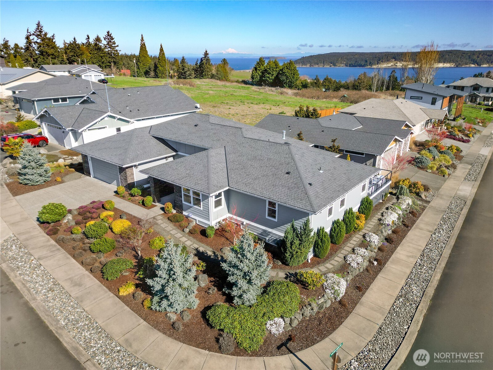 621 Jones Farm Road Sequim, WA 98382 - Photo 1 of 40 an aerial view of a house with a ocean view