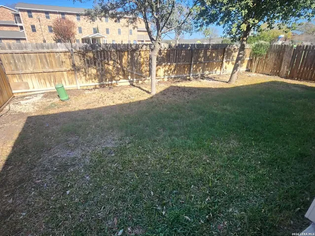 a view of yard with tree s