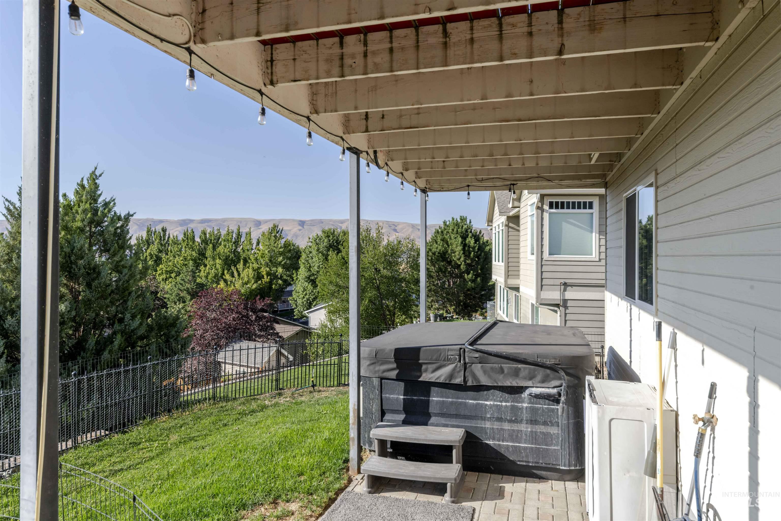 331 Reservoir Drive Lewiston, ID 83501 - Photo 32 of 42 Deck featuring a hot tub