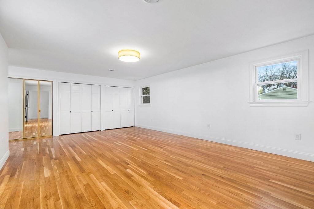 216 Grove Street Randolph, MA 02368 - Photo 17 of 34 a view of an empty room and wooden floor
