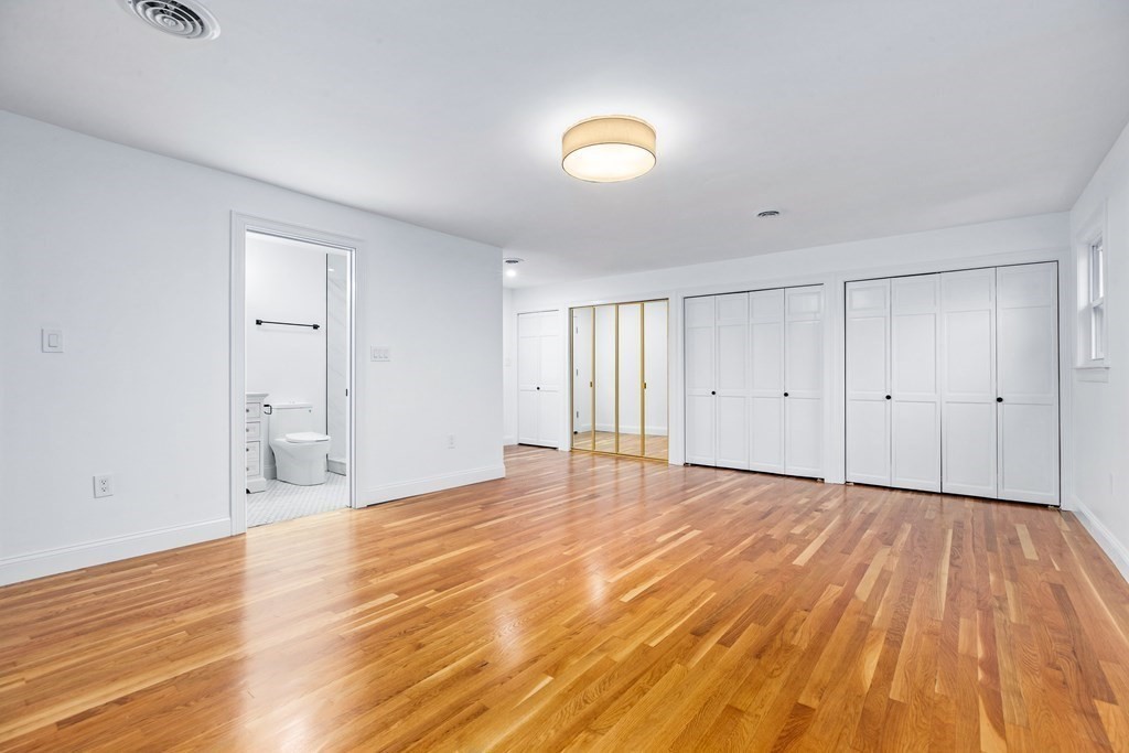 216 Grove Street Randolph, MA 02368 - Photo 18 of 34 a view of empty room with wooden floor