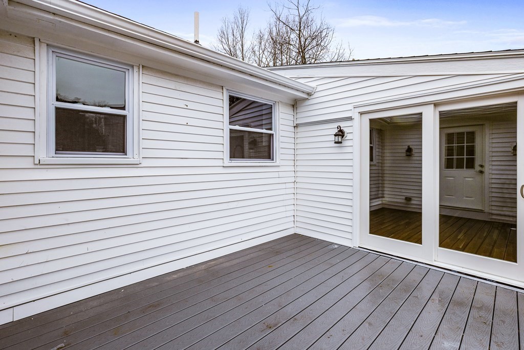 216 Grove Street Randolph, MA 02368 - Photo 31 of 34 a view of a house with wooden deck