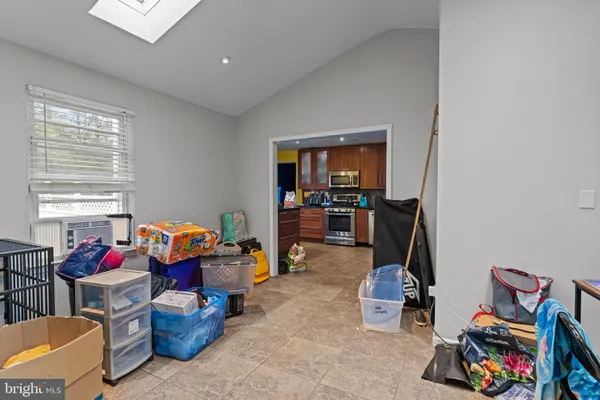 a room with furniture and a wooden floor