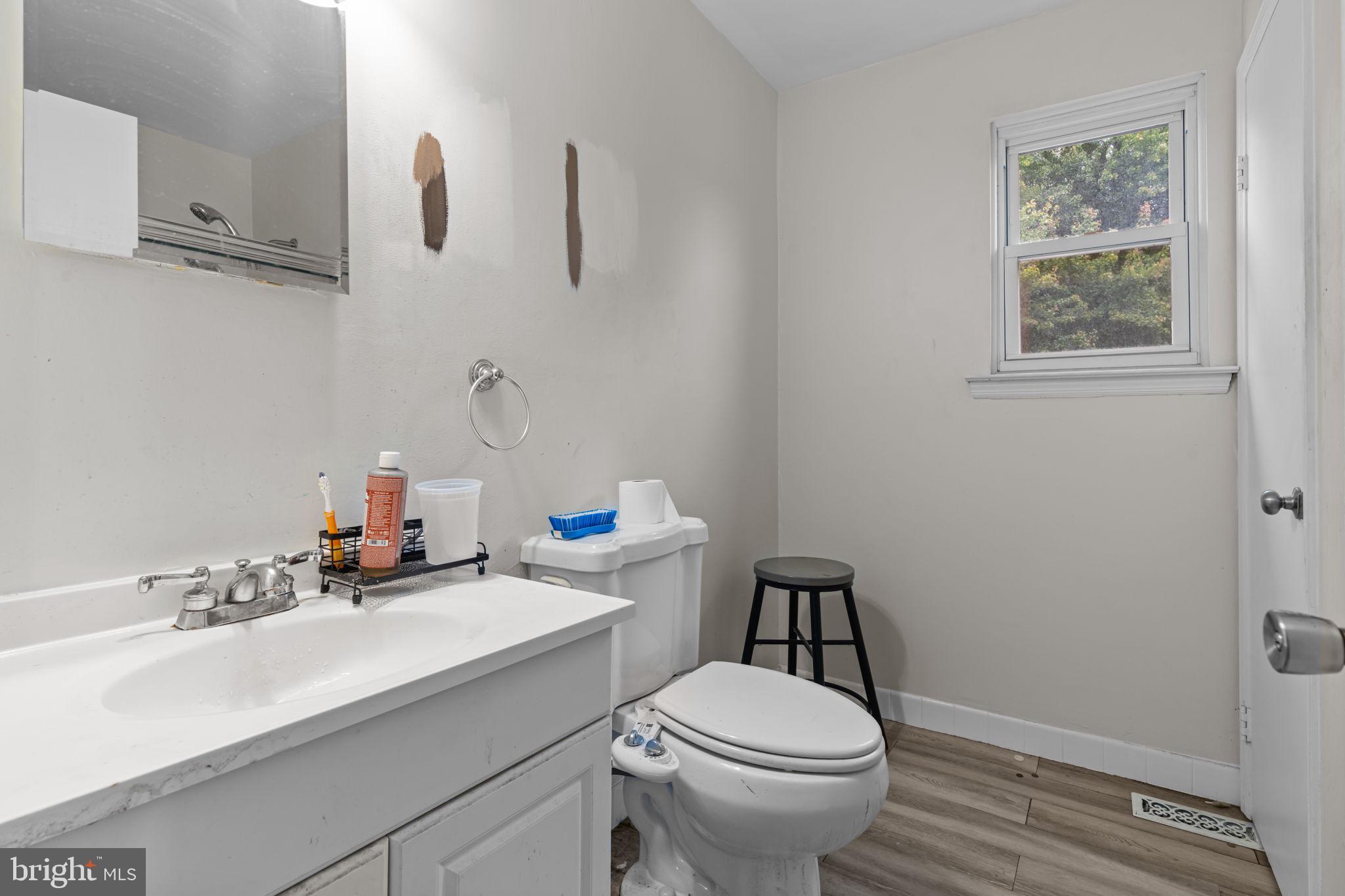 1 Woodhaven Way Sicklerville, NJ 08081 - Photo 27 of 40 a bathroom with a sink a toilet and mirror