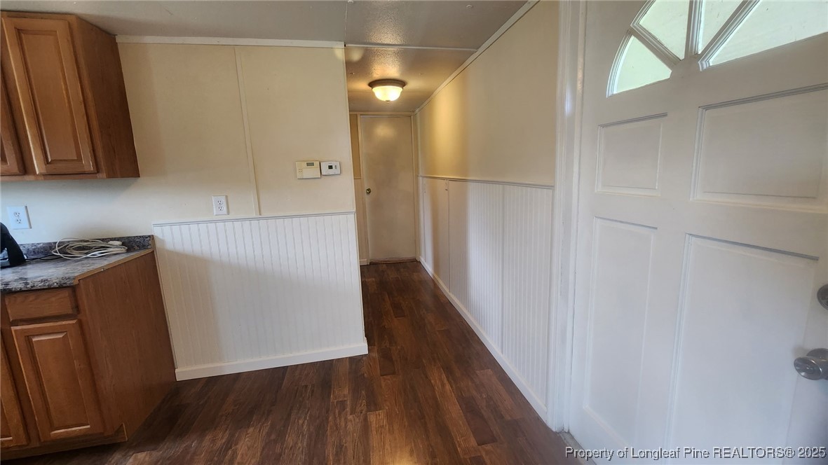 640 Faith Road Pembroke, NC 28372 - Photo 9 of 18 a view of a storage and utility room with wooden floor