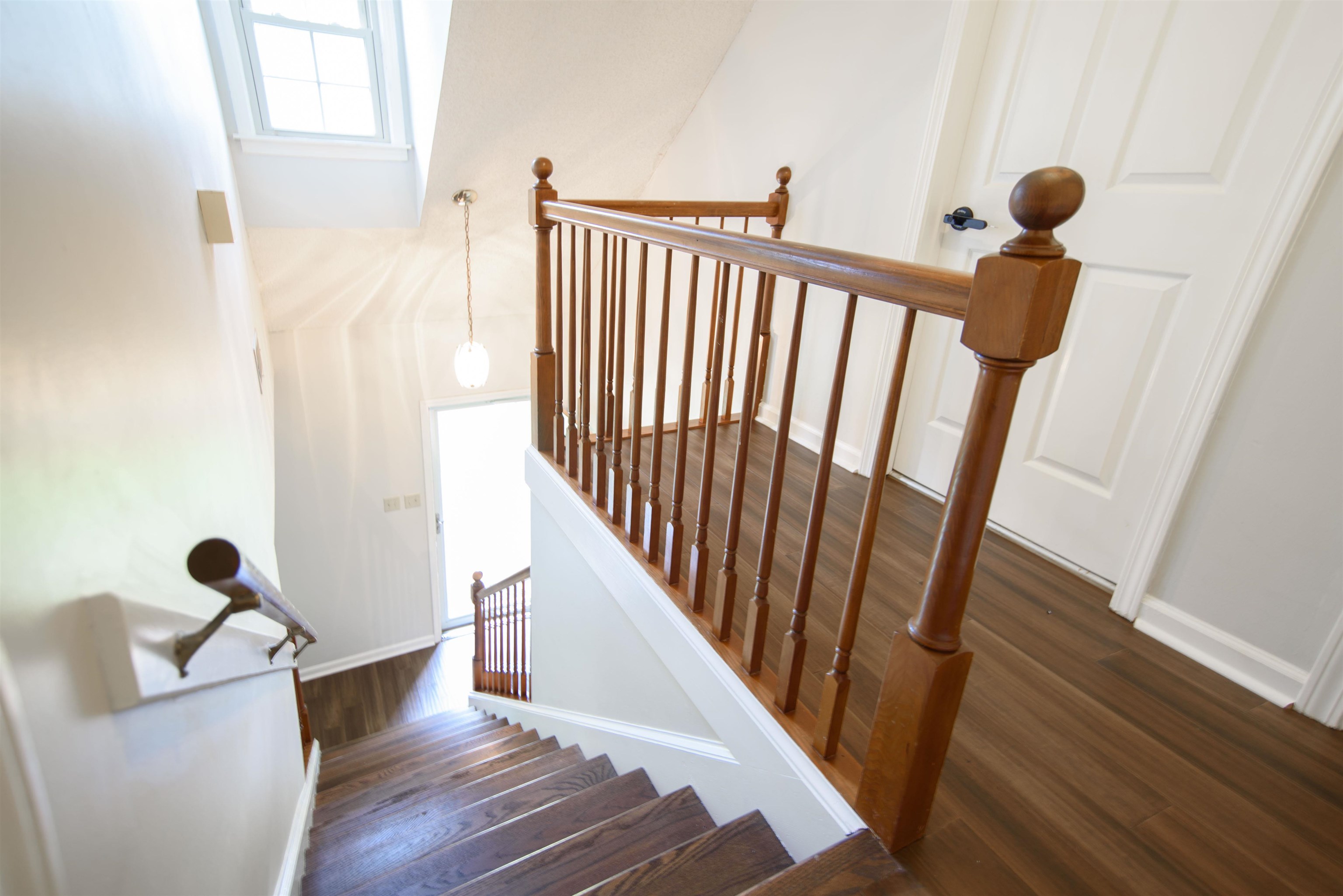 377 Great Falls Road Collierville, TN 38017 - Photo 9 of 16 a view of entryway and hall with wooden floor