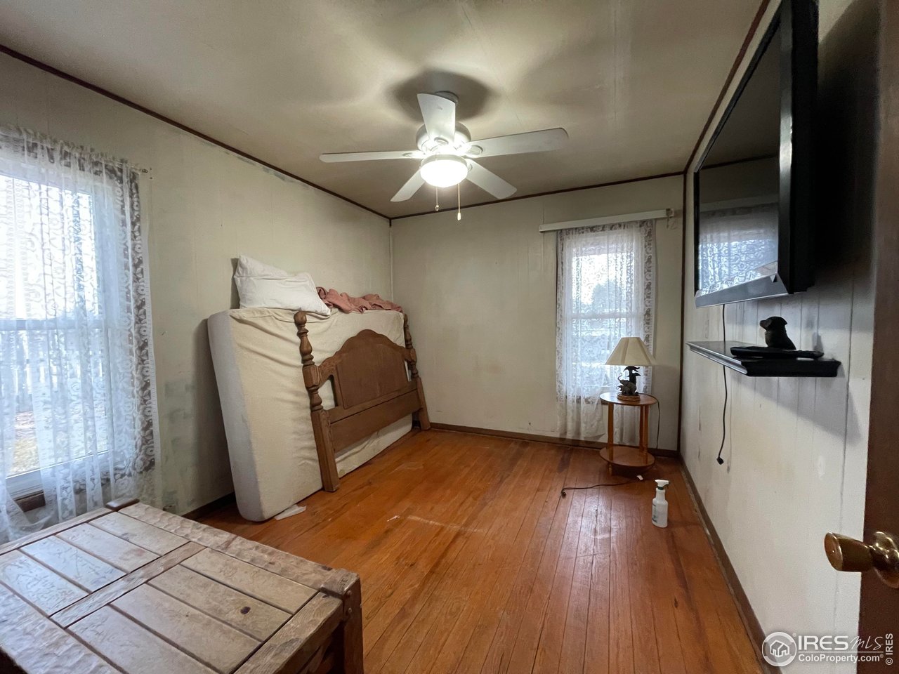 220 New York Avenue Stratton, CO 80836 - Photo 13 of 23 a view of a livingroom with furniture and a window