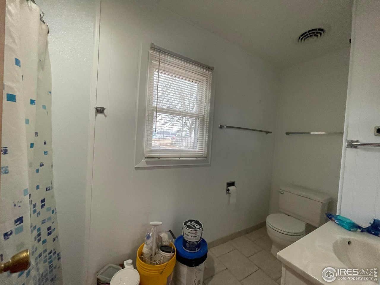 220 New York Avenue Stratton, CO 80836 - Photo 19 of 23 a bathroom with a toilet and a shower