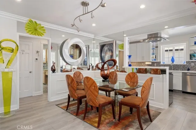 a kitchen with stainless steel appliances granite countertop a sink and cabinets