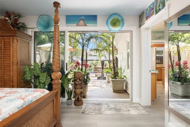 a bed room with a bed and a dresser