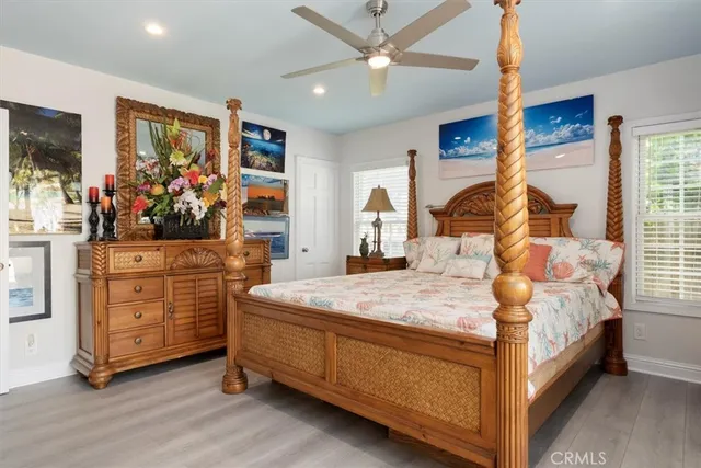 a en suite bathroom with a sink a mirror and shower