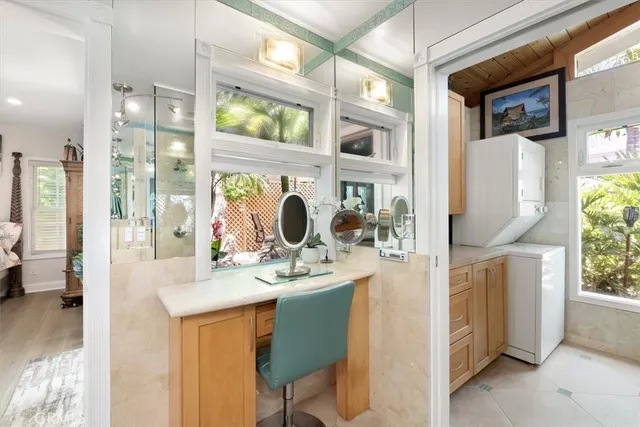 a bathroom with a double vanity sink and a mirror