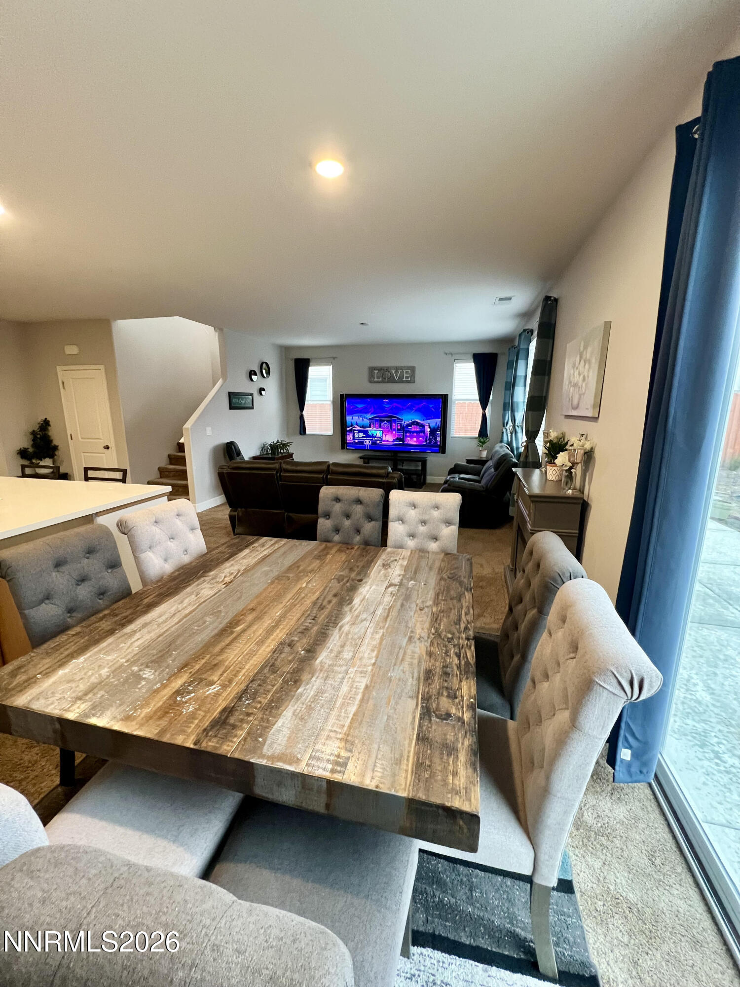 9355 Bay Drive Reno, NV 89506 - Photo 21 of 42 a bed room with a bed window and a couch