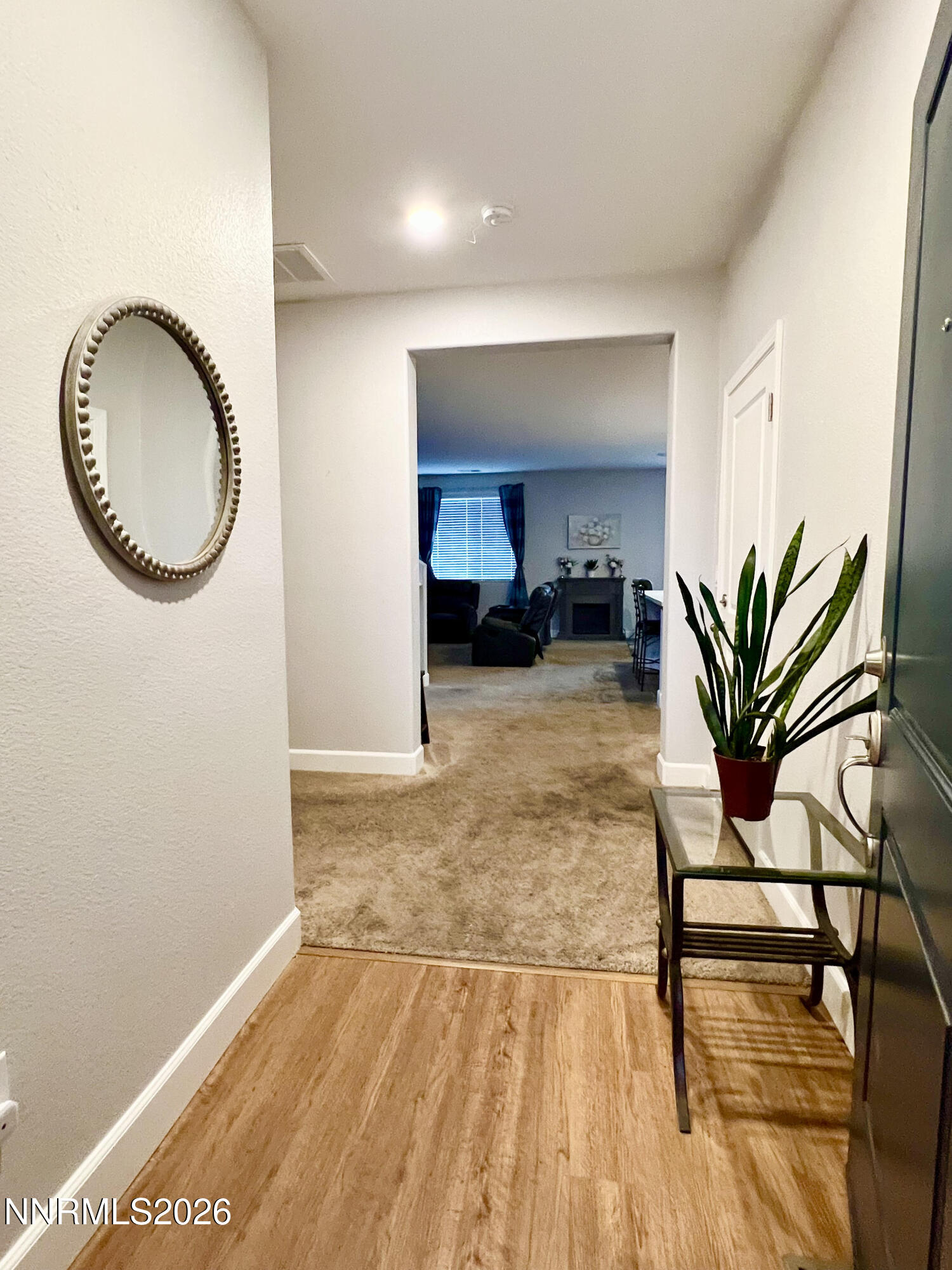 9355 Bay Drive Reno, NV 89506 - Photo 3 of 42 a view of a livingroom with furniture and a potted plant